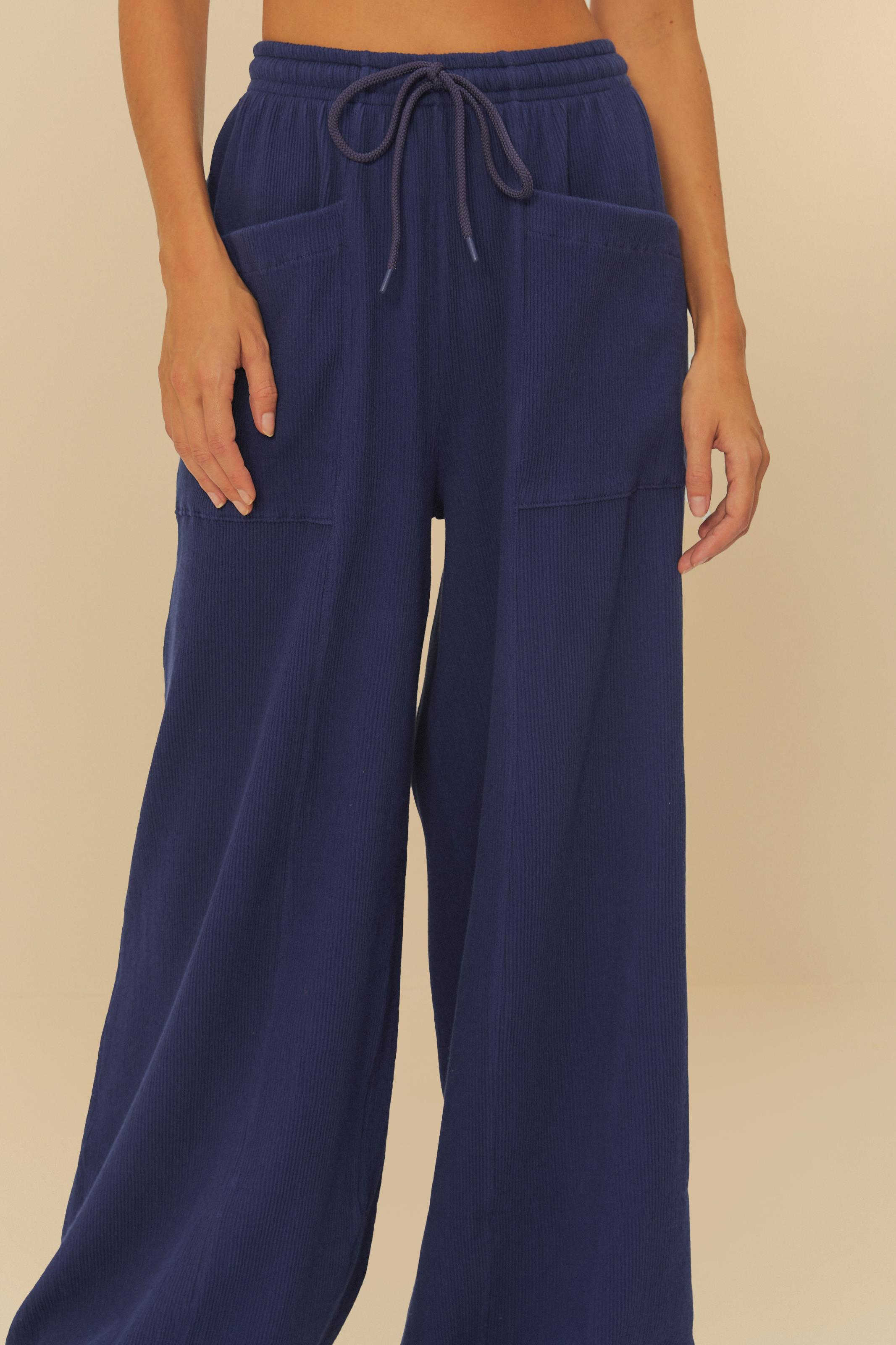 Calça Bolsos Textura